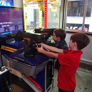 Playing Arcade Games. Great Family Entertainment