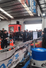 Large group of go kart drivers at Supa Karts waiting for there turn to race